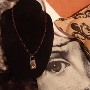 Groovy garnets w/focus compass charm